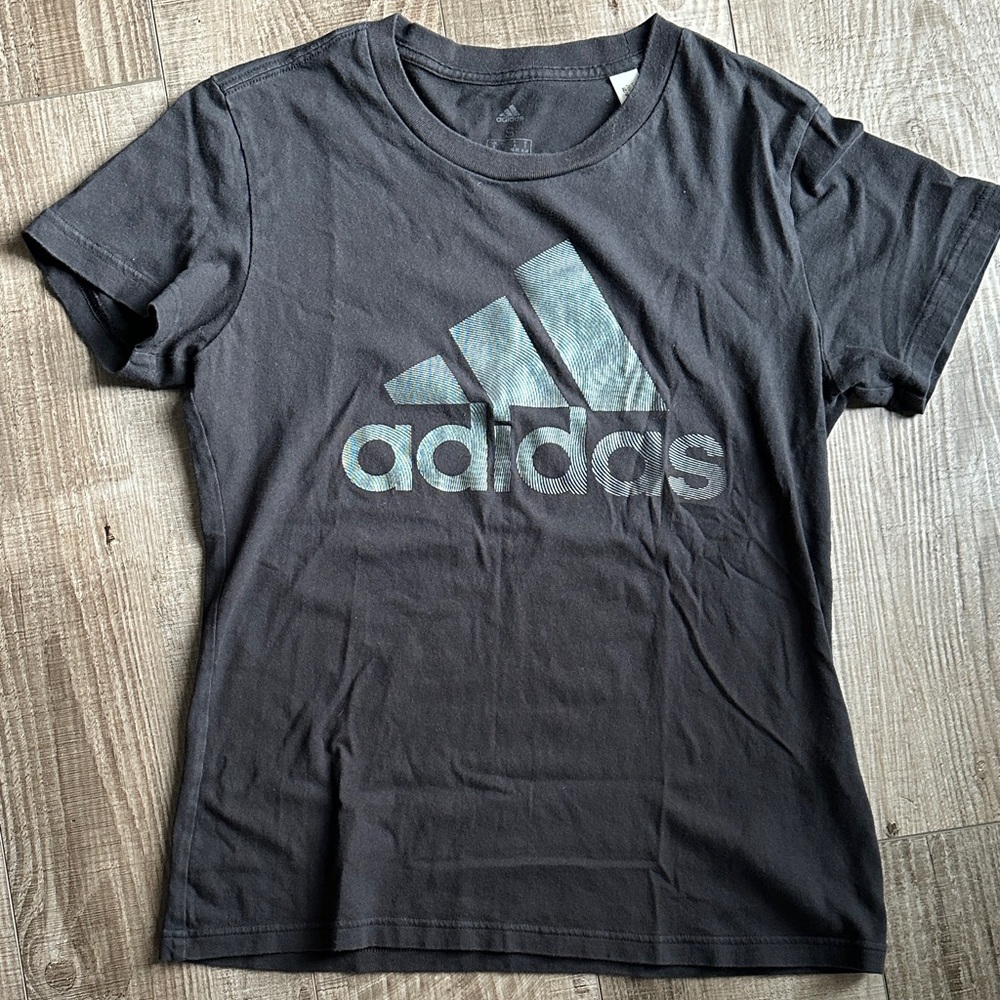 4/$20 Adidas Woman’s Black T-Shirt, teal iridescent print, size small